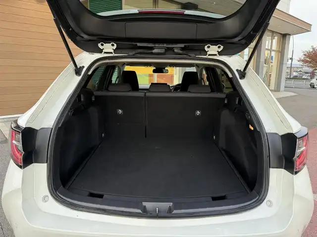 トヨタ カローラツーリング ハイブリッド G－X プラス 香川県 2021(令3)年 9.4万km ホワイトパールクリスタルシャイン ワンオーナー/ディスプレイオーディオナビ/フルセグ/バックカメラ/セーフティセンス/レーダークルーズ/オートハイビーム/レーンキープ/LEDヘッドライト/スマートキー/ビルトインETC