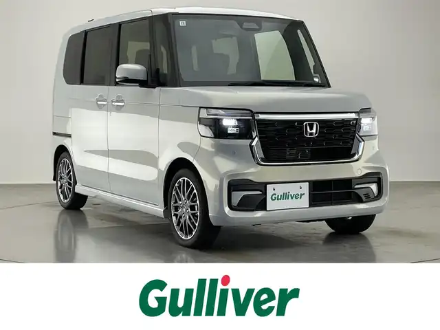 ホンダ Ｎ ＢＯＸ カスタム ターボ 愛知県 2024(令6)年 0.4万km プレミアムサンライトホワイトパール 純正８型ナビ　バックカメラ　シートヒーター　両側パワスラ　フルセグＴＶ　ハーフレザー　ホンダセンシング　衝突軽減　追従クルコン　ハンドル支援　パドルシフト　電動パーキング　ＬＥＤオートライト　禁煙車