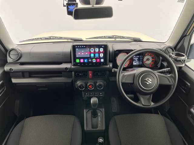 スズキ ジムニー XL 長野県 2024(令6)年 1.1万km シフォンアイボリーM ４ＷＤ・ターボ/社外ディスプレイオーディオ/Bluetooth Audio/衝突被害軽減ブレーキ/レーンディパーチャーアラート/オートライト/フォグランプ/バックソナー/スマートキー/プッシュスタート/アイドリングストップ/ETC2.0/背面タイヤ/前後ドライブレコーダー