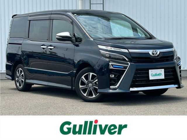 トヨタ ヴォクシー ZS 煌Ⅲ 愛媛県 2020(令2)年 2.2万km ブラッキッシュアゲハガラスフレーク フォグランプ/革ステ/クルコン/両側パワスラ/ＬＥＤ/オートライト/オートハイビーム/前後ドラレコ/ハーフレザーシート/純正アルミホイール/純正フロアマット/パーキングアシスト/クルーズコントロール有