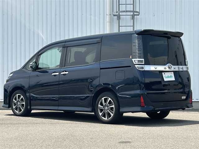 トヨタ ヴォクシー ZS 煌Ⅲ 愛媛県 2020(令2)年 2.2万km ブラッキッシュアゲハガラスフレーク フォグランプ/革ステ/クルコン/両側パワスラ/ＬＥＤ/オートライト/オートハイビーム/前後ドラレコ/ハーフレザーシート/純正アルミホイール/純正フロアマット/パーキングアシスト/クルーズコントロール有