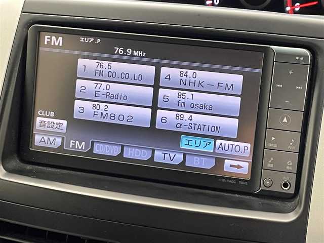 トヨタ ノア Si 滋賀県 2010(平22)年 13.2万km ホワイトパールクリスタルシャイン 禁煙車/純正７インチナビ/ （Bluetooth・フルセグTV・CD・DVD・AUX）/フリップダウンモニター/両側パワースライドドア/ETC/スマートキー/パドルシフト/HIDライト/オートライト/純正16インチアルミホイール/純正フロアマット