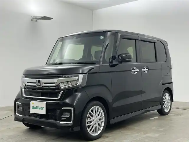 ホンダ Ｎ ＢＯＸ カスタム L ターボ 岡山県 2021(令3)年 4.2万km クリスタルブラックパール 純正８インチナビ/（CD/DVD/BT/Carplay/USB）/衝突軽減ブレーキ/両側電動スライド/クルーズコントロール/ビルトインＥＴＣ/シートヒーター/バックカメラ/ドライブレコーダー（前後）/コーナーセンサー（後）/ＬＥＤヘッドライト/オートハイビーム/オートライト/プッシュスタート/スマートキー/純正フロアマット/純正15インチAW/踏み間違い防止/ISOFIX/後席サンシェイド/ステアリングスイッチ/チルトステアリング/シートリフター/シートバックテーブル/ウインカーミラー/ドアバイザー
