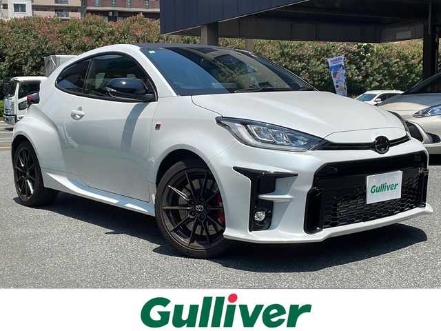 トヨタ ＧＲヤリス RZ ハイパフォーマンス 神奈川県 2021(令3)年 1.8万km プラチナホワイトパールマイカ ワンオーナー/6MT/4WDターボ車/ディスプレイオーディオ/・AppleCarPlay/BT/JBLサウンド/バックカメラ/ハーフレザーシート/ToyotaSafetySense/・プリクラッシュセーフティ/・レーントレーシングアシスト/・オートマチックハイビーム/・ロードサインアシスト/・レーダークルーズコントロール/・先行車発進告知機能/ブラインドスポットモニター/ヘッドアップディスプレイ/コーナーセンサー/ビルトインETC2.0/ドライブレコーダー/アイドリングストップ/純正18インチAW/プッシュEgスタート/ストップ/スマートキー×2/純正LEDヘッドライト/フォグランプ/ターンランプ付電動格納ドアミラー/純正フロアマット/取扱説明書/新車時保証書