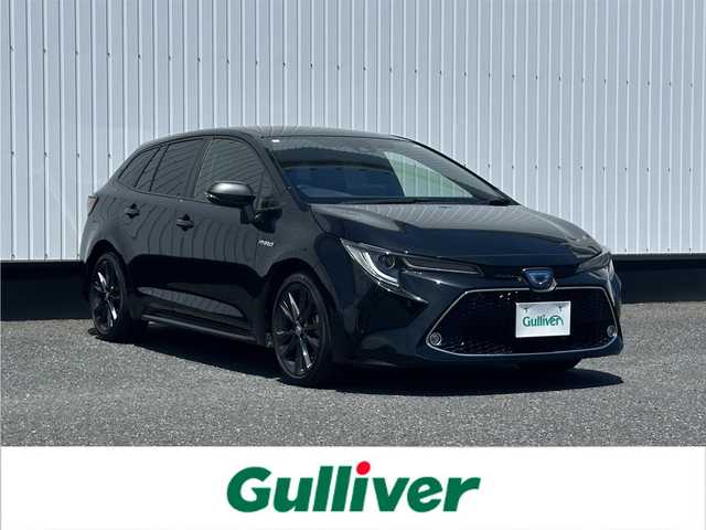 トヨタ カローラツーリング ハイブリッド ダブルバイビー 千葉県 2020(令2)年 3万km ブラックマイカ 純正9インチナビ/(フルセグTV BT FM AM)/バックカメラ/前後ドライブレコーダー/衝突被害軽減システム/車線逸脱警報/クルーズコントロール/ハーフレザーシート/横滑り防止装置/ビルトインETC/アイドリングストップ/LEDヘッドライト/フォグランプ/オートライト/ウィンカーミラー/電動格納ミラー/純正17インチAW/シートヒーター/シートリフター/ステアリングヒーター/ブラインドスポットモニター/プッシュスタート/スマートキー/フロアマット/スペアキー/取扱説明書/保証書