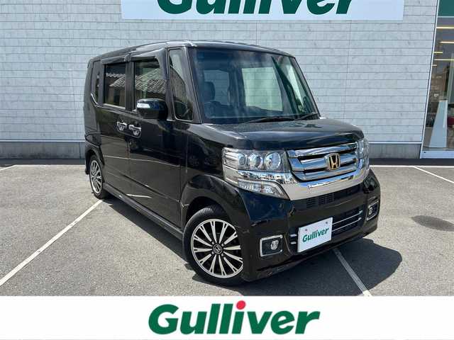 ホンダ Ｎ ＢＯＸ カスタム G ターボ Lパッケージ 静岡県 2015(平27)年 1.9万km スマートブラック ワンオーナー　/純正ナビ　/・ＴＶ　/・Ｂｌｕｅｔｏｏｔｈ接続　/・ＤＶＤ再生　/両側パワースライドドア/クルーズコントロール　/バックカメラ/プッシュスタート　/スマートキー　/ＥＴＣ　/ベンチシート　/ハーフレザー　/ＨＩＤオートライト/取扱説明書/保証書