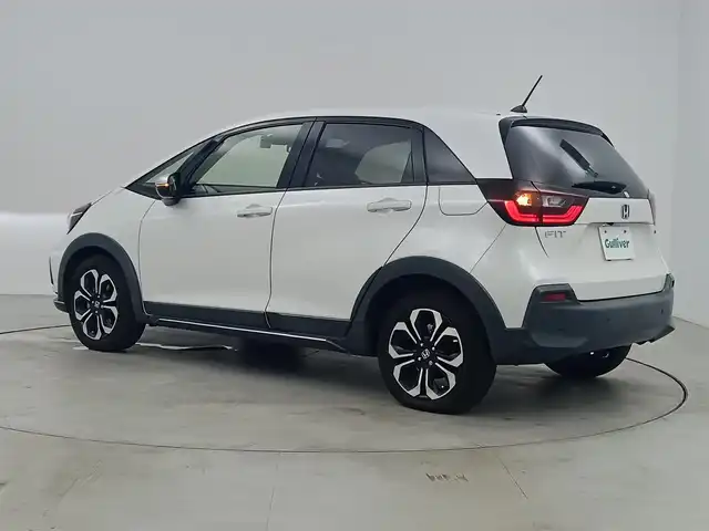 ホンダ フィット e:HEVクロスター 愛知県 2020(令2)年 3.6万km プラチナホワイトパール ホンダセンシング/・衝突軽減ブレーキシステム/・路外逸脱抑制機能/・アダプティブクルーズコントロール/・車線維持支援システム/・オートハイビーム/純正9インチナビ/USBポート/バックカメラ/前後ドライブレコーダー/ビルトインETC/ステアリングリモコン/純正LEDヘッドライト/純正16インチアルミホイール/電子パーキング/ブレーキホールド/スペアキー