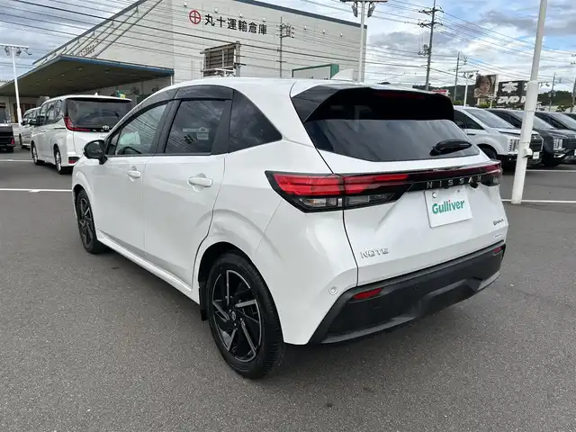 日産 ノート X 岡山県 2021(令3)年 0.4万km 白 登録時走行距離3883km/純正9インチナビ/（AM.FM.BT.フルセグ.HDMI）/インテリジェントエマージェンシーブレーキ/・被害軽減（自動）ブレーキ（対車両、歩行者）/・ペダル踏み間違い時加速抑制装置（前方）/・車線逸脱警報装置/・先進ライト/パノラミックビューモニター/デジタルインナーミラー/ワイヤレス充電/ドライブレコーダー/LEDヘッドライト/ETC2.0