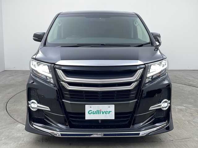 トヨタ アルファード S Cパッケージ 兵庫県 2017(平29)年 3.4万km ブラック ・アルパイン11インチナビ/Bluetooth/CD/DVD/SD/USB/テレビ/・バックカメラ/・アルパイン12.8インチリアフリップダウンモニター/・クルーズコントロール/・ドライブスタートコントロール/・純正ウッドコンビステアリング/・エグゼクティブシート/・クリアランスソナー/・イモビライザーシステム/・電子パーキングブレーキ/・オートホールド/・MTモード付AT/・ステアリングスイッチ/・ステアリングヒーター/・両側パワースライドドア/・パワーバックドア/・ハーフレザーシート/・全席パワーシート（運転席メモリー付き）/・オットマン/・社外フロアマット/・nanoe/・LEDヘッドライト/・純正規格外18インチアルミホイールタイヤ/・モデリスタエアロ/・モデリスタフロントグリル/・ビルトインETC/・プッシュスタートボタン/・スマートキー