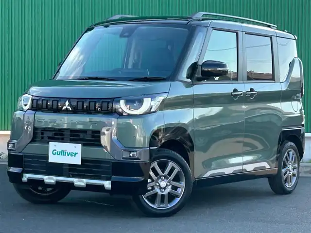 三菱 デリカミニ T プレミアム 宮城県 2024(令6)年 0.1千km 緑Ⅱ 2トーンカラー/＝＝＝/4WD/マイパイロット（レーダークルーズコントロール/車線維持支援機能）/マルチアラウンドモニター/デジタルルームミラー/e-アシスト/・衝突被害軽減ブレーキシステム/・踏み間違い衝突防止アシスト/・車線逸脱警報システム/・車線逸脱防止支援システム/・オートマチックハイビーム/・ふらつき警報/・前方衝突予測警報/・標識検知システム/・先行車発進通知/前後コーナーセンサー/横滑り防止装置/トラクションコントロール/純正9型ディスプレイオーディオ/・Bluetooth/・AM/FM/・AppleCarPlay/AndroidAuto/ハンズフリーパワースライドドア（両側）/ハーフレザーシート/前席シートヒーター/ステアリングヒーター/革巻きステアリング/ステアリングスイッチ/電動パーキングブレーキ/ブレーキホールド/アダプティブLEDヘッドライト/フォグランプ/オートライト/スマートキー＆プッシュスタート/スペアキー1本/電動格納ミラー/ルーフレール/純正15インチAW/W/サイド/カーテンエアバッグ/保証書・取説