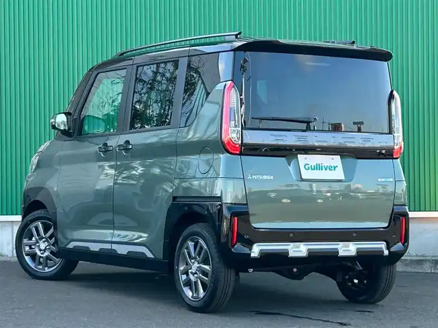 三菱 デリカミニ T プレミアム 宮城県 2024(令6)年 0.1千km 緑Ⅱ 2トーンカラー/＝＝＝/4WD/マイパイロット（レーダークルーズコントロール/車線維持支援機能）/マルチアラウンドモニター/デジタルルームミラー/e-アシスト/・衝突被害軽減ブレーキシステム/・踏み間違い衝突防止アシスト/・車線逸脱警報システム/・車線逸脱防止支援システム/・オートマチックハイビーム/・ふらつき警報/・前方衝突予測警報/・標識検知システム/・先行車発進通知/前後コーナーセンサー/横滑り防止装置/トラクションコントロール/純正9型ディスプレイオーディオ/・Bluetooth/・AM/FM/・AppleCarPlay/AndroidAuto/ハンズフリーパワースライドドア（両側）/ハーフレザーシート/前席シートヒーター/ステアリングヒーター/革巻きステアリング/ステアリングスイッチ/電動パーキングブレーキ/ブレーキホールド/アダプティブLEDヘッドライト/フォグランプ/オートライト/スマートキー＆プッシュスタート/スペアキー1本/電動格納ミラー/ルーフレール/純正15インチAW/W/サイド/カーテンエアバッグ/保証書・取説
