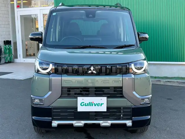 三菱 デリカミニ T プレミアム 宮城県 2024(令6)年 0.1千km 緑Ⅱ 2トーンカラー/＝＝＝/4WD/マイパイロット（レーダークルーズコントロール/車線維持支援機能）/マルチアラウンドモニター/デジタルルームミラー/e-アシスト/・衝突被害軽減ブレーキシステム/・踏み間違い衝突防止アシスト/・車線逸脱警報システム/・車線逸脱防止支援システム/・オートマチックハイビーム/・ふらつき警報/・前方衝突予測警報/・標識検知システム/・先行車発進通知/前後コーナーセンサー/横滑り防止装置/トラクションコントロール/純正9型ディスプレイオーディオ/・Bluetooth/・AM/FM/・AppleCarPlay/AndroidAuto/ハンズフリーパワースライドドア（両側）/ハーフレザーシート/前席シートヒーター/ステアリングヒーター/革巻きステアリング/ステアリングスイッチ/電動パーキングブレーキ/ブレーキホールド/アダプティブLEDヘッドライト/フォグランプ/オートライト/スマートキー＆プッシュスタート/スペアキー1本/電動格納ミラー/ルーフレール/純正15インチAW/W/サイド/カーテンエアバッグ/保証書・取説