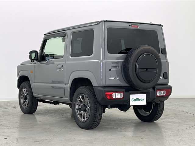 スズキ ジムニー XC 宮城県 2020(令2)年 6.4万km ミディアムグレー ワンオーナー/ディーラーOPフットイルミ、ドアランプ/スズキセーフティサポート/・車線逸脱抑制制御機能/レーダーブレーキサポート/社外8インチナビ/・CD.DVD.SD.BT/バックカメラ/フルセグTV/前席シートヒーター/革巻きステアリング/ステアリングスイッチ/ETC2.0/ドライブレコーダー（FR）/プッシュスタート/スマートキー/LEDヘッドライト/フォグライト/純正フロアマット/純正16インチAW/レザー調シートカバー/純正ドアバイザー/ダウンヒルアシスト/横滑り防止