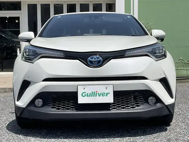 トヨタ Ｃ－ＨＲ G 埼玉県 2017(平29)年 1.2万km ホワイトパールクリスタルシャイン ワンオーナー/純正9インチSDナビTV【NSZT-Y66T】/(DVD//Bluetooth/MSV)/バックカメラ/ハーフレザーシート/前席シートヒーター/LEDヘッドライト/クリアランスソナー/ブラインドスポットモニター/純正18インチアルミホイール/ビルトインETC2.0/セーフティセンスP/・プリクラッシュセーフティシステム/・レーンディパーチャーアラート/・レーダークルーズコントロール/プッシュスタート/スマートキー/保証書付整備手帳/外部検査実施済み