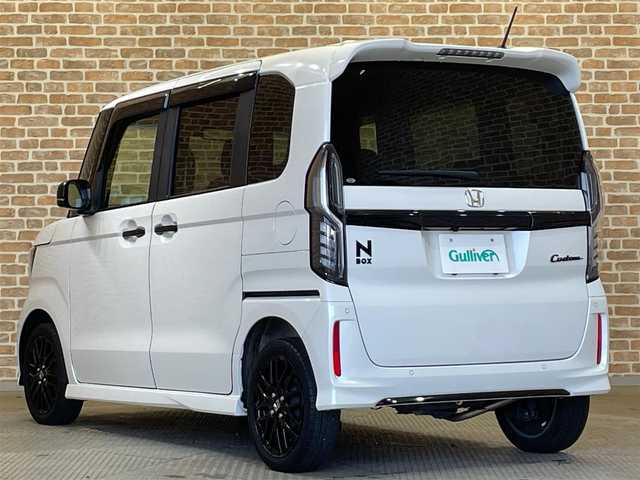 ホンダ Ｎ ＢＯＸ カスタム L ターボ スタイル+ブラック 岩手県 2022(令4)年 3.3万km プラチナホワイトパール ワンオーナー/４WD/ターボ/両側パワースライドドア/パドルシフト/ホンダセンシング/衝突軽減ブレーキ/渋滞追従機能付きクルーズコントロール/レーンアシスト/オートハイビーム/コーナーセンサー/横滑り防止装置/アイドリングストップ/前席シートヒーター/ロールサンシェード/シートバックテーブル/チップアップリヤシート/純正ナビ/（CD/DVD/フルセグ/SD/USB/Bluetooth/AppleCarPlay）/バックカメラ/ETC/純正ドライブレコーダー（SD欠）/ヘッドライトレベライザー/LEDヘッドライト/LEDフォグランプ/純正15インチアルミホイール