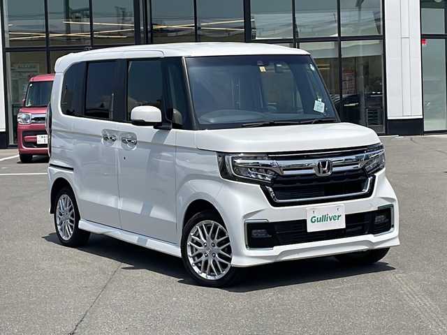 ホンダ Ｎ ＢＯＸ カスタム L ターボ 青森県 2022(令4)年 1.7万km プラチナホワイトパール ・4WD/・純正ナビ/・DVD/CD/USB/SD/Bluetooth/・フルセグ/・バックカメラ/・プッシュスタート/・スマートキー/・スペアキー１本/・ホンダセンシング/・横滑り防止/・オートライト/・LEDヘッドライト/・クルーズコントロール（追従あり）/・ビルドインETC/・コーナーセンサー（前後）/・電子制御パーキングブレーキ/・両側パワースライドドア/・ドライブレコーダー/・後部座席サンシェード/・電灯格納ウィンカーミラー/・純正フロアマット/・純正AW（15インチ）