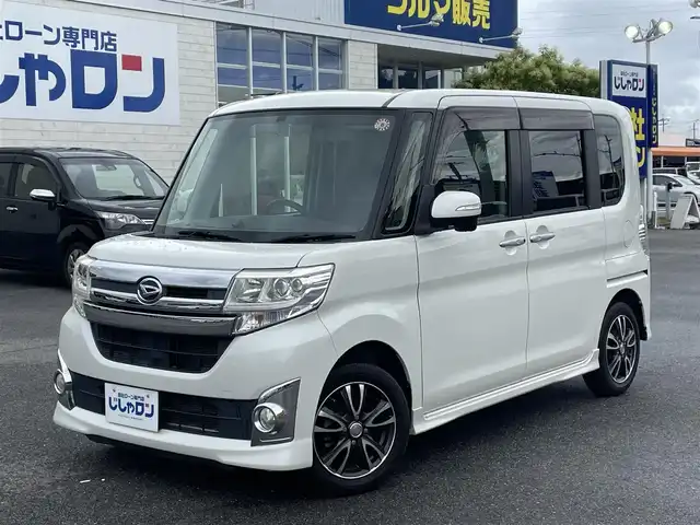 ダイハツ タント カスタム X スマートセレ SN 佐賀県 2014(平26)年 6.7万km パールホワイトⅢ （株）IDOMが運営する【じしゃロン佐賀店】の自社ローン専用車両になります。/こちらは現金またはオートローンご利用時の価格です。自社ローンご希望の方は別途その旨お申し付けください/スマートアシスト機能なしです/・登録時６６，１１８キロ　/・片側電動スライド　/・ＳＤナビ　　/・ＢＴオーディオ　/・ワンセグＴＶ　/・ＨＤＭＩ　ＵＳＢ　/・社外ＥＴＣ　/・バックカメラ