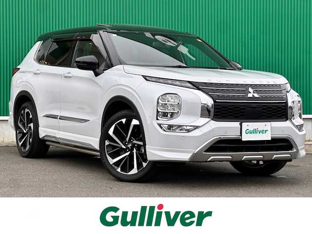 三菱 アウトランダー ＰＨＥＶ P 宮城県 2023(令5)年 2.3万km ホワイトダイヤモンド パノラマサンルーフ/＝＝＝/eアシスト/・衝突被害軽減ブレーキシステム/・踏み間違い衝突防止アシスト/・車線逸脱警報機能/・車線逸脱防止支援機能/・ふらつき警報/・前方衝突予測警報/・標識認識システム/・後側方衝突被害防止支援システム/・後側方車両検知警報システム（レーンチェンジアシスト機能付）/・後退時車両検知警報システム/マイパイロット/BOSEプレミアムサウンドシステム/スマートフォン連携ナビゲーション/・9インチディスプレイ/・メモリーナビ/・地デジTV/・AppleCarPlay/AndroidAuto/・USB/マルチアラウンドモニター/ヘッドアップディスプレイ/ビルトインETC/ドライブレコーダー/ワイヤレス充電器/AC100V/1500W/ハンズフリーパワーバックドア/レザーシート/パワーシート（運転席メモリー機能付）/シートヒーター/革巻きステアリング/パドルシフト/電動パーキングブレーキ/ブレーキホールド/アダプティブLEDヘッドランプ/フォグランプ/純正20インチAW/ドアバイザー/フロアマット