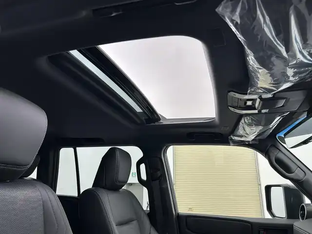 トヨタ ランドクルーザー ２５０ VX 熊本県 2024(令6)年 0.2万km ブラック ワンオーナー　/サンルーフ　/純正１２．３インチディスプレイオーディオ　/全周囲カメラ　/ビルトインＥＴＣ２．０　/トヨタセーフティーセンス/・リアクロストラフィックアラート/・後方車両接近通報装置/・ロードサインアシスト/・レーダークルーズコントロール/・リアカメラディテクション/横滑り防止/アイドリングストップ/パワーバックドア/デジタルインナーミラー/オートブレーキホールド/前席シートヒーター　/前席エアーシート　/運転席パワーシート　/前後クリアランスソナー　/純正１８インチAW/オートライト/オートマチックハイビーム/LEDヘッドライト/フォグライト/スマートキー/プッシュスタート/スペアキー1本/保証書