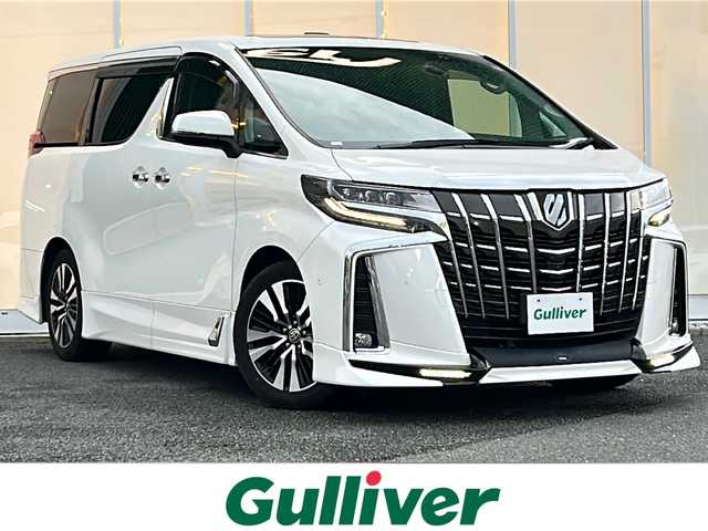 トヨタ アルファード S Cパッケージ 福岡県 2020(令2)年 6.9万km ホワイトパールクリスタルシャイン メーカーOPナビJBLプレミアムサウンドシステム/純正フリップダウン10.3インチ/アラウンドビューモニター/サンルーフ/ワンオーナー/TRDエアロ(FSR)/純正デジタルインナーミラー/社外ドライブレコーダー/トヨタセーフティセンス/D席＋N席シートヒーター＆クーラー/ステアリングヒーター/両側パワースライドドア/パワーバックドア/スペアキー1本