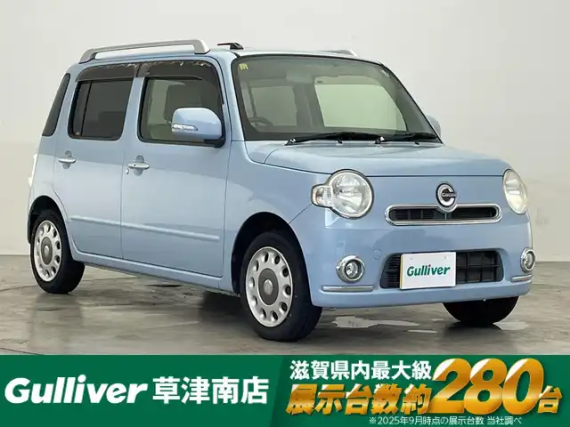 ダイハツ ミラ ココア プラスX 滋賀県 2012(平24)年 6.6万km ミストブルーマイカメタリック 社外6.1インチナビ/【CD/DVD/ワンセグTV/AUX】/バックカメラ/前方ドライブレコーダー/プッシュスタート/スマートキー/ドアバイザー/純正フロアマット