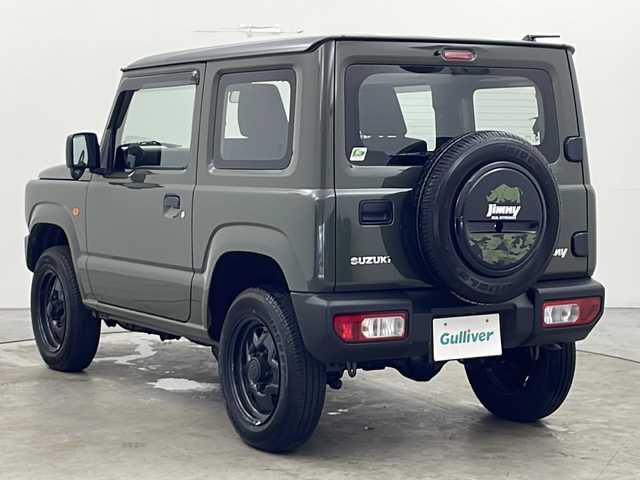 スズキ ジムニー XG 秋田県 2021(令3)年 1.1万km ジャングルグリーン ４WD/ワンオーナー/純正オーディオDPX-U740BTH　CD　BT/衝突被害軽減システム/レーンキープアシスト/ヒルディーセントコントロール/純正16インチアルミ装着/純正フロアマット/背面タイヤ/リモコンキー　スペアキー1本/ダブルサイドエアバッグ/カーテンエアバッグ/ヘッドライトレベライザー/ドアバイザー/盗難防止装置/保証書/取り扱い説明書