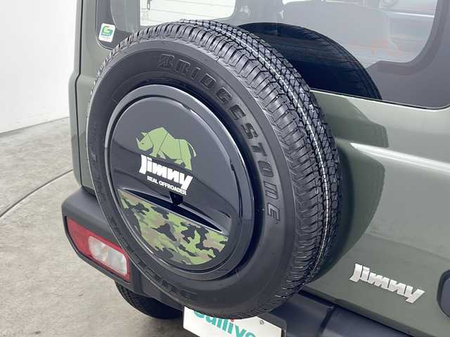 スズキ ジムニー XG 秋田県 2021(令3)年 1.1万km ジャングルグリーン ４WD/ワンオーナー/純正オーディオDPX-U740BTH　CD　BT/衝突被害軽減システム/レーンキープアシスト/ヒルディーセントコントロール/純正16インチアルミ装着/純正フロアマット/背面タイヤ/リモコンキー　スペアキー1本/ダブルサイドエアバッグ/カーテンエアバッグ/ヘッドライトレベライザー/ドアバイザー/盗難防止装置/保証書/取り扱い説明書