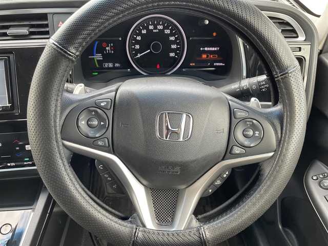 ホンダ シャトル ハイブリッド X ホンダセンシング 大分県 2018(平30)年 7.9万km クリスタルブラックパール レーダークルーズコントロール/ステアリングスイッチ/パドルシフト/ETC/オートライト/LEDヘッドライト/衝突軽減ブレーキ/レーンキープアシスト/シートヒーター/ハーフレザーシート/フォグランプ/電動格納ミラー/純正アルミホイール/サイドバイザー/フロアマット