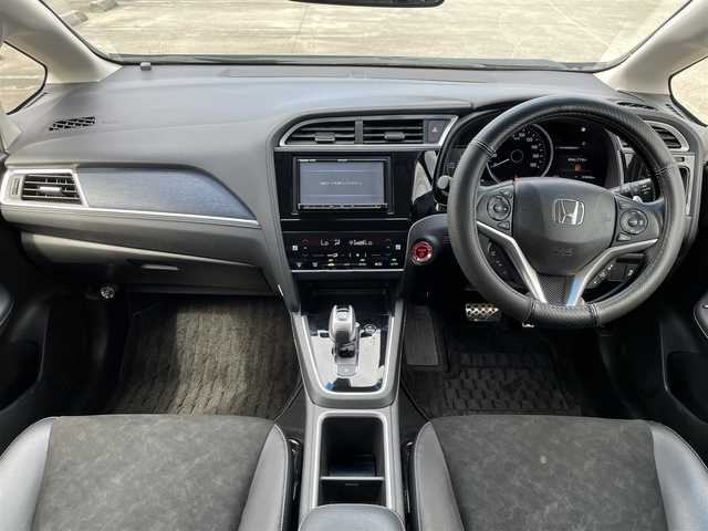 ホンダ シャトル ハイブリッド X ホンダセンシング 大分県 2018(平30)年 7.9万km クリスタルブラックパール レーダークルーズコントロール/ステアリングスイッチ/パドルシフト/ETC/オートライト/LEDヘッドライト/衝突軽減ブレーキ/レーンキープアシスト/シートヒーター/ハーフレザーシート/フォグランプ/電動格納ミラー/純正アルミホイール/サイドバイザー/フロアマット