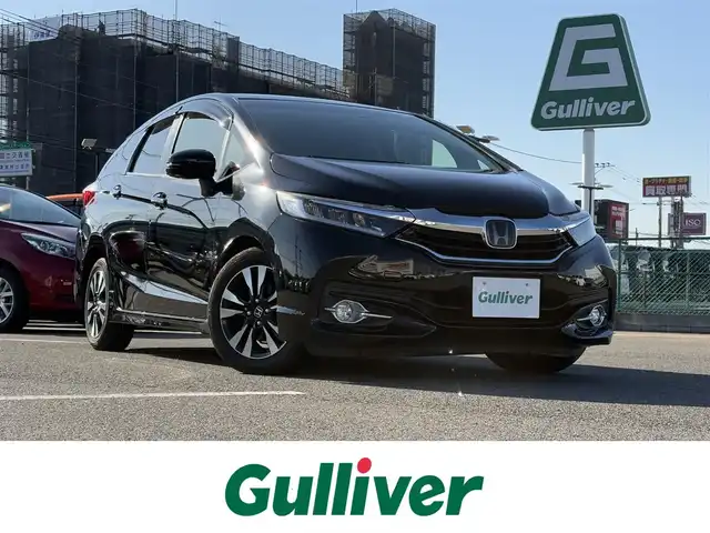 ホンダ シャトル ハイブリッド X ホンダセンシング 大分県 2018(平30)年 7.9万km クリスタルブラックパール レーダークルーズコントロール/ステアリングスイッチ/パドルシフト/ETC/オートライト/LEDヘッドライト/衝突軽減ブレーキ/レーンキープアシスト/シートヒーター/ハーフレザーシート/フォグランプ/電動格納ミラー/純正アルミホイール/サイドバイザー/フロアマット
