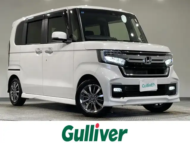 ホンダ Ｎ ＢＯＸ カスタム L 愛知県 2021(令3)年 2.4万km プラチナホワイトパール 純正ナビ/（Bluetooth/CD・DVD再生/フルセグTV/SD/ラジオ/CarPlay)/衝突軽減ブレーキ　/両側パワースライドドア　/レーダークルーズコントロール　/シートヒーター　/ＬＥＤヘッドライト　/LEDフォグランプ/コーナーセンサー　/レーンキープアシスト/先行車発進お知らせ/標識認識機能/バックカメラ　/ドライブレコーダー　/ＵＳＢ接続　/純正フロアマット