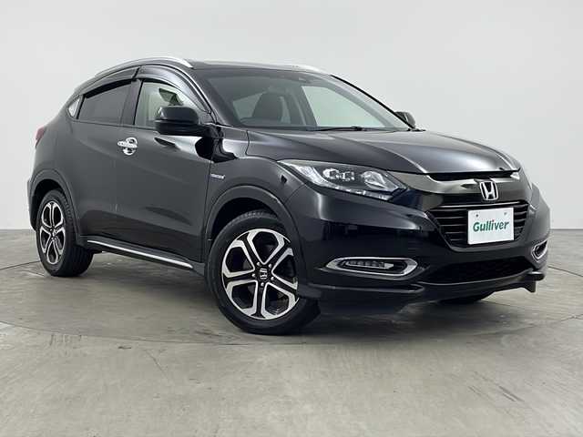 ホンダ ヴェゼル ハイブリッド Z ホンダセンシング 兵庫県 2018(平30)年 6.7万km クリスタルブラックパール ・ワンオーナー車/・純正ナビ/Bluetooth/CD/DVD/SD/USB/TV/・バックカメラ/・ホンダセンシング/・衝突軽減ブレーキ/・誤発進抑制機能/・歩行者事故低減ステアリング/・路外逸脱抑制機能/・アダプティブクルーズコントロール/・車線維持支援システム/・先行車発進お知らせ機能/・標識認識機能/・車両接近通報装置/・ステアリングスイッチ/・パドルシフト/・社外フロアマット/・ハーフレザーシート/・前席シートヒーター/・電子パーキングブレーキ/・オートホールドブレーキ/・純正17インチアルミホイールタイヤ/・LEDヘッドライト/・フォグランプ/・ビルトインETC/・スマートキー/・スペアキー/・取扱説明書/・保証書/・コンフォートビューパッケージ