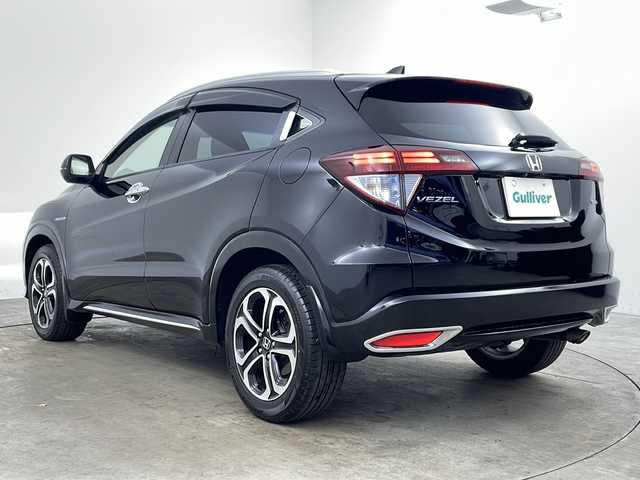 ホンダ ヴェゼル ハイブリッド Z ホンダセンシング 兵庫県 2018(平30)年 6.7万km クリスタルブラックパール ・ワンオーナー車/・純正ナビ/Bluetooth/CD/DVD/SD/USB/TV/・バックカメラ/・ホンダセンシング/・衝突軽減ブレーキ/・誤発進抑制機能/・歩行者事故低減ステアリング/・路外逸脱抑制機能/・アダプティブクルーズコントロール/・車線維持支援システム/・先行車発進お知らせ機能/・標識認識機能/・車両接近通報装置/・ステアリングスイッチ/・パドルシフト/・社外フロアマット/・ハーフレザーシート/・前席シートヒーター/・電子パーキングブレーキ/・オートホールドブレーキ/・純正17インチアルミホイールタイヤ/・LEDヘッドライト/・フォグランプ/・ビルトインETC/・スマートキー/・スペアキー/・取扱説明書/・保証書/・コンフォートビューパッケージ