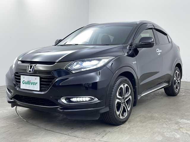 ホンダ ヴェゼル ハイブリッド Z ホンダセンシング 兵庫県 2018(平30)年 6.7万km クリスタルブラックパール ・ワンオーナー車/・純正ナビ/Bluetooth/CD/DVD/SD/USB/TV/・バックカメラ/・ホンダセンシング/・衝突軽減ブレーキ/・誤発進抑制機能/・歩行者事故低減ステアリング/・路外逸脱抑制機能/・アダプティブクルーズコントロール/・車線維持支援システム/・先行車発進お知らせ機能/・標識認識機能/・車両接近通報装置/・ステアリングスイッチ/・パドルシフト/・社外フロアマット/・ハーフレザーシート/・前席シートヒーター/・電子パーキングブレーキ/・オートホールドブレーキ/・純正17インチアルミホイールタイヤ/・LEDヘッドライト/・フォグランプ/・ビルトインETC/・スマートキー/・スペアキー/・取扱説明書/・保証書/・コンフォートビューパッケージ