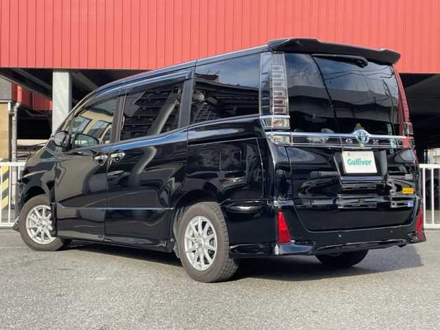 トヨタ ヴォクシー ハイブリッド ZS 煌Ⅲ 神奈川県 2021(令3)年 5.5万km ブラック ワンオーナー				/純正9インチSDナビ【NSZT-Y68T】			/・DTV/SD/CD/DVD/REC/BT				/純正フリップダウンモニター/バックカメラ/クリアランスソナー/ハーフレザーシート/前席シートヒーター/ビルトインETC2.0/ToyotaSafetySense/・プリクラッシュセーフティー/・レーンディパーチャーアラート				/・オートマチックハイビーム/・先行車発進告知機能/両側パワースライドドア/クルーズコントロール/ドライブレコーダー/社外15インチAW/サマータイヤ付純正17インチAW車載		/オートライト/純正LEDヘッドライト				/フォグランプ			/プッシュEgスタート/ストップ			/スマートキー×2	/ドアバイザー/純正フロアマット/取扱説明書/ナビ取扱説明書				/新車時保証書