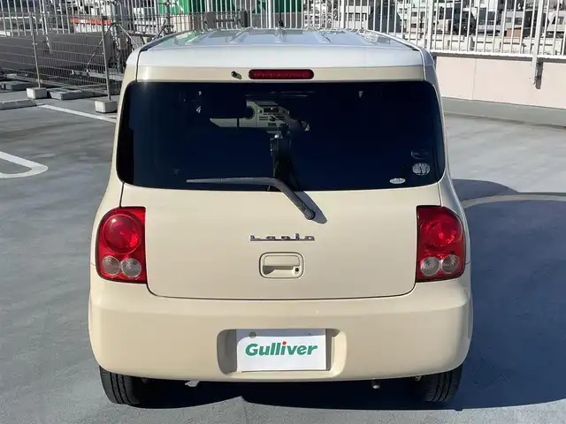 スズキ ラパン X 東京都 2009(平21)年 8.6万km ベージュⅡ 純正CDデッキ/純正１４インチアルミ/エンジンプッシュボタン/スマートキー/バイザー・マット/ABS/Wエアバック/取説