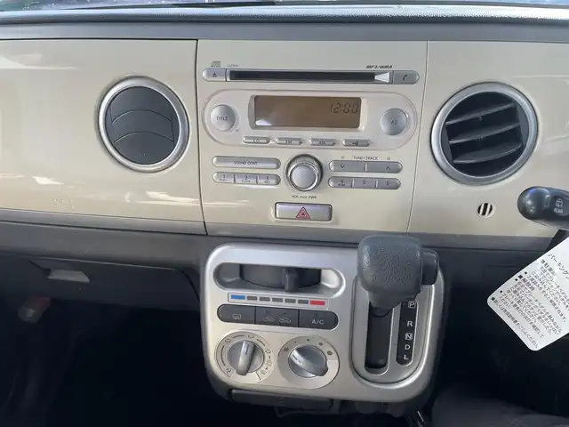 スズキ ラパン X 東京都 2009(平21)年 8.6万km ベージュⅡ 純正CDデッキ/純正１４インチアルミ/エンジンプッシュボタン/スマートキー/バイザー・マット/ABS/Wエアバック/取説