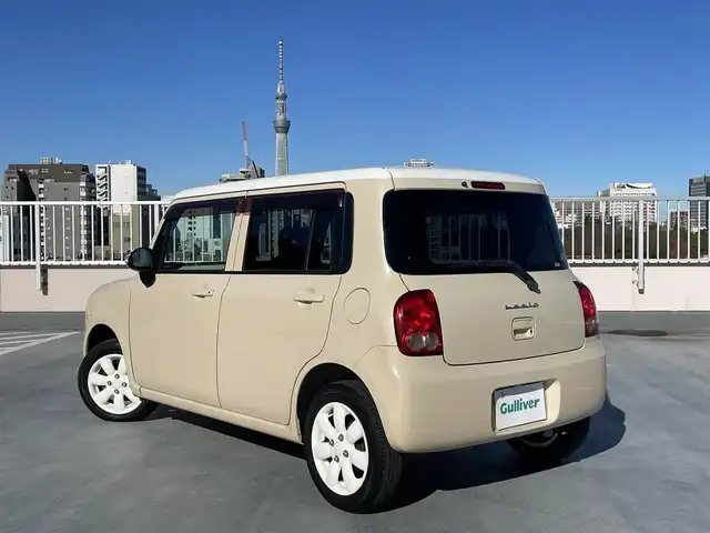 スズキ ラパン X 東京都 2009(平21)年 8.6万km ベージュⅡ 純正CDデッキ/純正１４インチアルミ/エンジンプッシュボタン/スマートキー/バイザー・マット/ABS/Wエアバック/取説