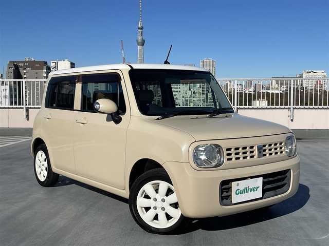 スズキ ラパン X 東京都 2009(平21)年 8.6万km ベージュⅡ 純正CDデッキ/純正１４インチアルミ/エンジンプッシュボタン/スマートキー/バイザー・マット/ABS/Wエアバック/取説