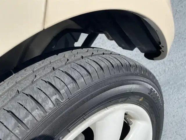 スズキ ラパン X 東京都 2009(平21)年 8.6万km ベージュⅡ 純正CDデッキ/純正１４インチアルミ/エンジンプッシュボタン/スマートキー/バイザー・マット/ABS/Wエアバック/取説