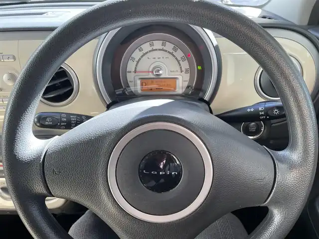 スズキ ラパン X 東京都 2009(平21)年 8.6万km ベージュⅡ 純正CDデッキ/純正１４インチアルミ/エンジンプッシュボタン/スマートキー/バイザー・マット/ABS/Wエアバック/取説