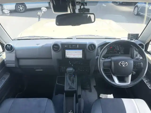 トヨタ ランドクルーザー AX 栃木県 2024(令6)年 0.7万km ベージュ ワンオーナー/AUTHORセキュリティ/carrozzeriaナビ（BT/フルセグTV/FM/AM/CD/DVD)/バックカメラ/クルーズコントロール/セーフティセンス/LEDヘッドランプ/純正フロアマット/ETC/ドライブレコーダー/背面タイヤ/リモコンキー/スペアキー（１本）/保障証/取扱説明書