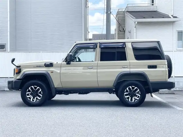 トヨタ ランドクルーザー AX 栃木県 2024(令6)年 0.7万km ベージュ ワンオーナー/AUTHORセキュリティ/carrozzeriaナビ（BT/フルセグTV/FM/AM/CD/DVD)/バックカメラ/クルーズコントロール/セーフティセンス/LEDヘッドランプ/純正フロアマット/ETC/ドライブレコーダー/背面タイヤ/リモコンキー/スペアキー（１本）/保障証/取扱説明書