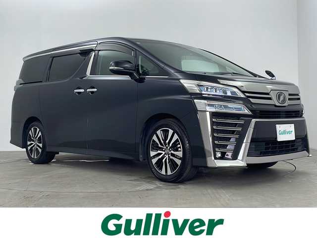 トヨタ ヴェルファイア Z Gエディション 鹿児島県 2018(平30)年 3.5万km スパークリングブラックパールクリスタルシャイン 純正メーカーOPナビ/【AM/FM/CD/DVD/フルセグTV/Bluetooth】/JBLプレミアムサウンド/純正フリップダウンモニター/バックカメラ/ビルトインETC/両側パワースライドドア/トヨタセーフティセンス/・プリクラッシュセーフティ/・レーントレーシングアシスト/・レーダークルーズコントロール/・先行車発進お知らせ機能/・ロードサインアシスト/シートメモリ/D/N席パワーシート/D/N席シートヒーター/D/N席エアシート/レザーシート/オットマン/オートワイパー/オートライト/オートハイビーム/純正18インチAW/純正フロアマット/横滑り防止装置/盗難防止装置