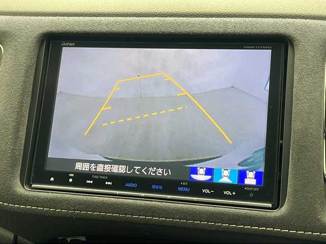 ホンダ ヴェゼル ハイブリッド 千葉県 2017(平29)年 7.3万km ホワイトオーキッドパール 禁煙車/純正SDナビ【VXM-175VFEi】/(FM/AM/CD/DVD/TV/Bluetooth/SD/USB/iPod)/ホンダセンシング/衝突軽減ブレーキ/アダプティブクルーズコントロール/先行車発進告知/路外逸脱抑制システム/レーンキープアシスト/リアクティブフォースペダル/標識認識機能/バックカメラ/ドラレコ(前方のみ)/スペアキー（１本）/前席シートヒーター/ＬＥＤヘッドライト/純正18インチアルミホイール/純正フロアマット/電動パーキングブレーキ/パドルシフト/フォグランプ/ハーフレザーシート/ステアリングスイッチ/ドアバイザー/電動格納ウィンカーミラー/取扱説明書