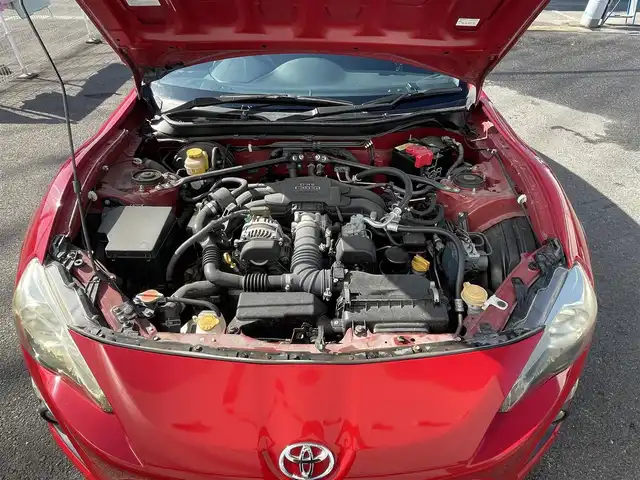 トヨタ ８６ GT 佐賀県 2012(平24)年 7万km ライトニングレッド 純正ナビ/・バックカメラ/・フルセグTV/BT/CD/DVD/社外ドラレコ型デジタルインナーミラー(SDなし)/HIDヘッドライト/オートライト/フォグランプ/純正17インチＡＷ/パドルシフト/ＥＴＣ/プッシュスタート/スペアキー×1/取扱説明書/保証書