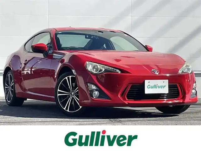 トヨタ ８６ GT 佐賀県 2012(平24)年 7万km ライトニングレッド 純正ナビ/・バックカメラ/・フルセグTV/BT/CD/DVD/社外ドラレコ型デジタルインナーミラー(SDなし)/HIDヘッドライト/オートライト/フォグランプ/純正17インチＡＷ/パドルシフト/ＥＴＣ/プッシュスタート/スペアキー×1/取扱説明書/保証書