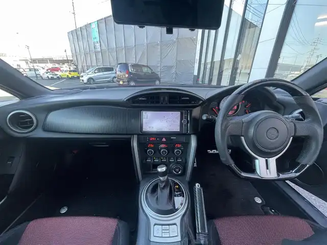 トヨタ ８６ GT 佐賀県 2012(平24)年 7万km ライトニングレッド 純正ナビ/・バックカメラ/・フルセグTV/BT/CD/DVD/社外ドラレコ型デジタルインナーミラー(SDなし)/HIDヘッドライト/オートライト/フォグランプ/純正17インチＡＷ/パドルシフト/ＥＴＣ/プッシュスタート/スペアキー×1/取扱説明書/保証書