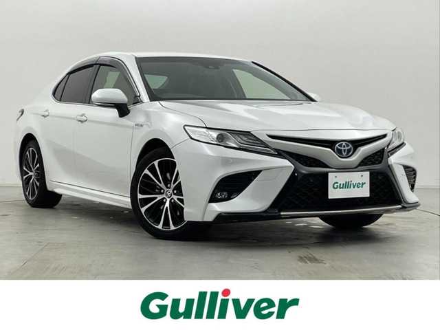 トヨタ カムリ WSレザーパッケージ 群馬県 2020(令2)年 10.7万km プラチナホワイトパールマイカ AC100V/CD/DVDプレーヤー/純正８インチディスプレイナビ/・JBLプレミアムサウンドシステム/・フルセグTV/Apple CarPlay/Android Auto/・AM/FM/Bluetooth/USB/Miracast//＝＝＝＝＝＝＝/Toyota Safety Sense/・プリクラッシュセーフティ/・レーンディパーチャーアラート/・オートマチックハイビーム/・レーダークルーズコントロール/インテリジェントクリアランスソナー/カラーヘッドアップディスプレイ/ブラインドスポットモニター/リヤクロストラフィックオートブレーキ/車両接近通報装置/パドルシフト/前席パワーシート/シートヒーター