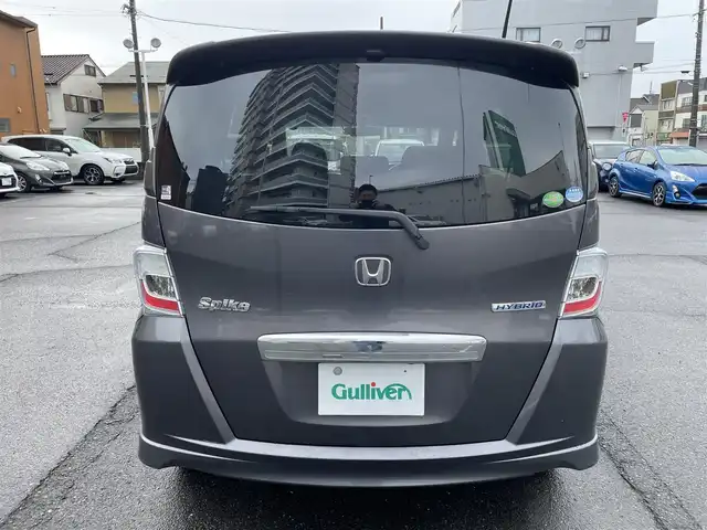 ホンダ フリード スパイク ハイブリット 静岡県 2013(平25)年 8万km モダンスティールM ワンオーナー/前後方向ドライブレコーダー/純正メモリナビ/・SD/USB/CD/DVD/バックカメラ/両側スライドドア/ステアリングリモコン/オートライト/ＥＴＣ/キーレス/純正ゴムマット/純正ＨＩＤヘッドライト/新車時保証書/取扱説明書